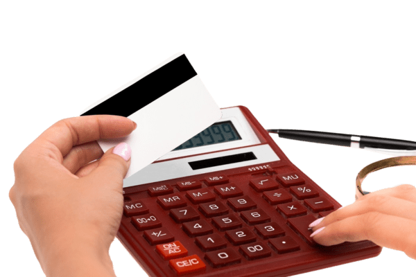 budgeting-1 red calculator, pen, magnifying glass, and a blank magnetic stripe card to indicate budgeting